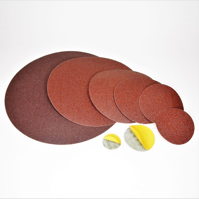 dischi tela abrasiva resinata rossa pesante + adesivo tranciati d. mm. 200  p 180 a tipo corindone
